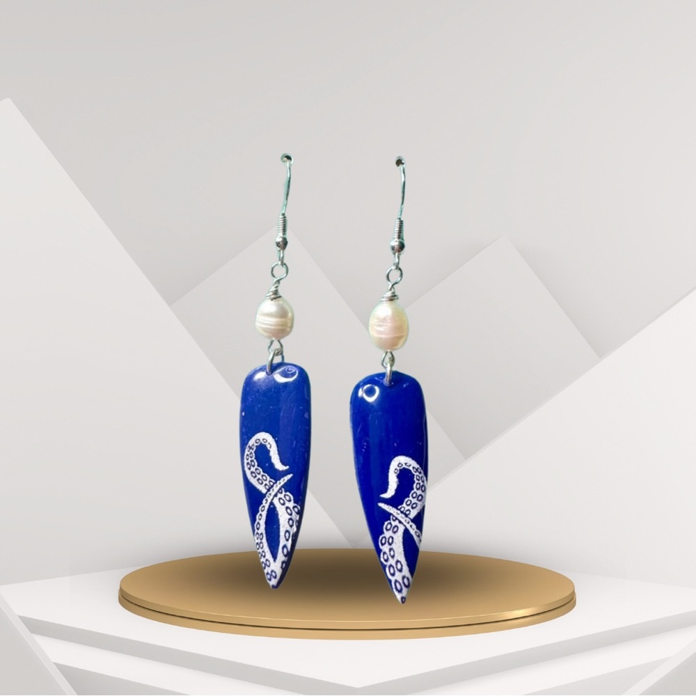 Hand crafted blue and white octopus tentacle polymer clay earrings with pearls